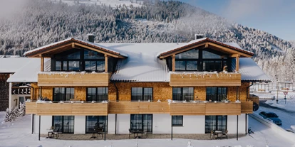 Hotels an der Piste - Pools: Außenpool beheizt - Pflach - Alpin Lodges Oberjoch