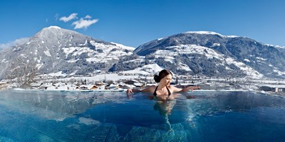 Hotels an der Piste - Parkplatz: kostenlos beim Hotel - 32 Grad Infinity Outdoorpool - Alpin Family Resort Seetal ****s