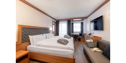 Hotels an der Piste - Skiraum: Skispinde - Wolkenstein in Gröden - Room comfort - Hotel Stella - My Dolomites Experience