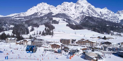 Hotels an der Piste - Skiraum: versperrbar - Eschenau (Taxenbach) - Außenansicht Winter - Hotel Salzburger Hof Leogang