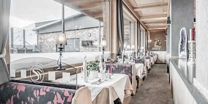 Hotels an der Piste - Österreich - Speisesaal mit Blick auf die Sonnenterrasse - SKI | GOLF | WELLNESS Hotel Riml ****s