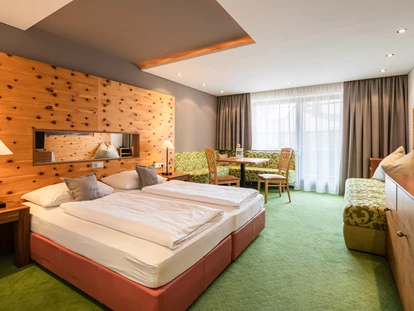 Hotels an der Piste - Hotel-Schwerpunkt: Skifahren & Familie - Going am Wilden Kaiser - Wohlfühlzimmer - Wander- & Wellnesshotel Gassner****s