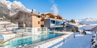 Hotels an der Piste - Skiraum: Skispinde - Skicircus Saalbach Hinterglemm Leogang Fieberbrunn - Good Life Resort die Riederalm ****S