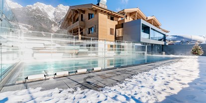 Hotels an der Piste - Skiraum: Skispinde - Leogang - Good Life Resort die Riederalm ****S