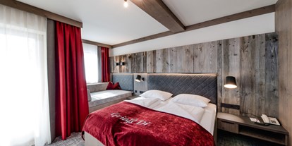 Hotels an der Piste - Parkplatz: kostenlos beim Hotel - Doppelzimmer mit Kuschelecke - **** Hotel Alpenrose Zauchensee