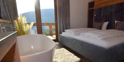 Hotels an der Piste - Verpflegung: Frühstück - Mayrhofen (Mayrhofen) - Alpinloft Goldsun Masterbedroom - Chalets & Apartments Wachterhof