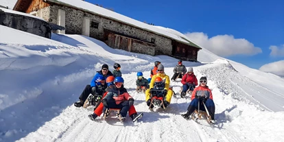 Hotels an der Piste - Skikurs direkt beim Hotel: für Kinder - Uderns - Rodeln Schlittenfahren - Chalets & Apartments Wachterhof