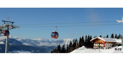 Hotels an der Piste - Hotel-Schwerpunkt: Skifahren & Romantik - Söll - Skipiste und Mittelstation der Gondelbahn zur Hohen Salve in unmittelbarer Nähe zur Ferienwohnung Tenn - Ferienwohnung Tenn