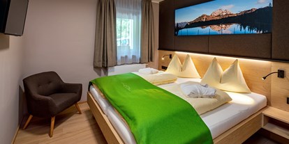 Hotels an der Piste - Suite mit offenem Kamin - Hotel Gartnerkofel