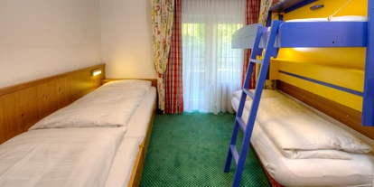 Hotels an der Piste - Skiraum: videoüberwacht - Going am Wilden Kaiser - Kinderzimmer - The RESI Apartments "mit Mehrwert"