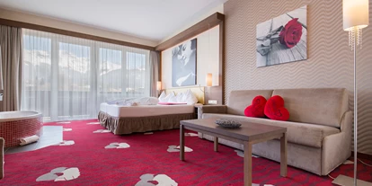 Hotels an der Piste - Suite mit offenem Kamin - Zams - Themen-Zimmer Kuss - Romantik & Spa Alpen-Herz