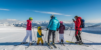 Hotels an der Piste - Skikurs direkt beim Hotel: für Kinder - Schlaipf - Genuss beim Ski Fahren mit der Familie - Familienhotel Hinteregger
