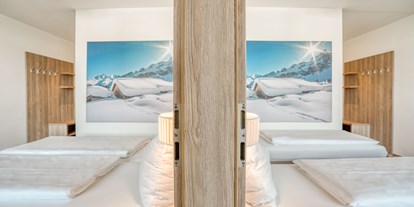 Hotels an der Piste - Rodeln - Familienzimmer - COOEE alpin Hotel Kitzbüheler Alpen