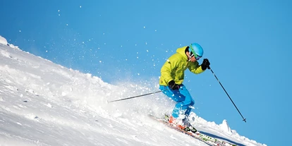 Hotels an der Piste - Skikurs direkt beim Hotel: für Erwachsene - Krakauschatten - Skifahren - Basekamp Mountain Budget Hotel