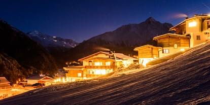 Hotels an der Piste - Skiraum: Skispinde - Aussenansicht Winter - Grünwald Resort Sölden