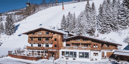 Hotels an der Piste - Hotel-Schwerpunkt: Skifahren & Kulinarik - Leogang - Direkt an der Schönleitenbahn gelegen. - Hotel Tiroler Buam