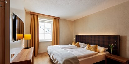 Hotels an der Piste - Skiraum: Skispinde - APRES POST HOTEL Zimmeransicht - APRES POST HOTEL