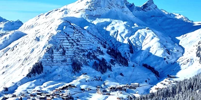 Hotels an der Piste - Ladestation Elektroauto - Ausserbraz - Warth am Arlberg mit Wartherhorn Panorama - Lech Valley Lodge