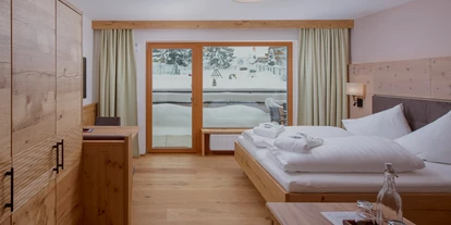 Hotels an der Piste - Ski-In Ski-Out - Unterwössen - die Premium Zimmer Juniorsuite Melisse  - Naturhotel Kitzspitz
