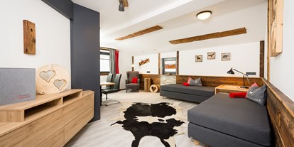 Hotels an der Piste - Hotel-Schwerpunkt: Skifahren & Party - Almsuite 55 m² Wohnbereich - Hotel Astrid