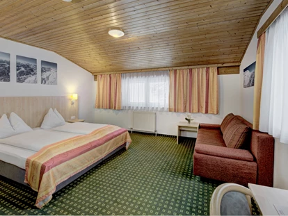 Hotels an der Piste - Hotel-Schwerpunkt: Skifahren & Kulinarik - Gseng (Abtenau, Rußbach am Paß Gschütt) - Doppelzimmer Family - Hotel Bike & Snow Lederer