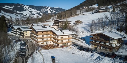 Hotels an der Piste - Skiraum: Skispinde - Hotel direkt an der Piste des Bergfried Liftes mitten im Skigebiet Saalbach-Hinterglemm-Leogang - Dein MOUNTAIN Wohlfühlhotel Johanneshof