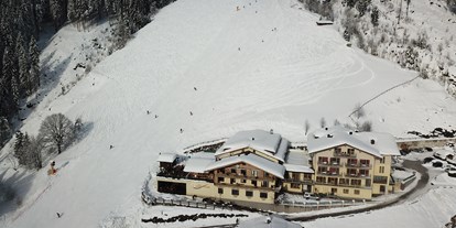 Hotels an der Piste - Hotel-Schwerpunkt: Skifahren & Familie - Hotelansicht mit Skipiste
 - Berghotel Jaga-Alm