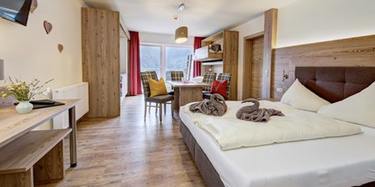 Hotels an der Piste - Skiraum: Skispinde - Neues Familienzimmer Tauernblick - Küche extra buchbar - Berghotel Jaga-Alm