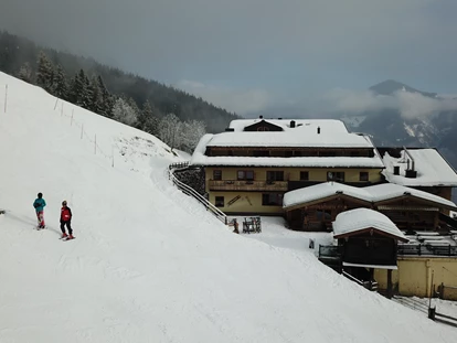 Hotels an der Piste - Hotel-Schwerpunkt: Skifahren & Familie - Enkerbichl - Direkt auf der Piste - Berghotel Jaga-Alm