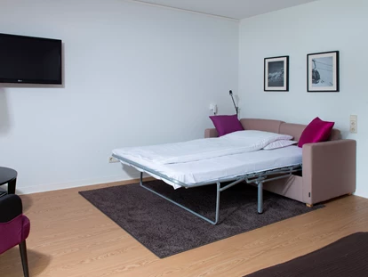 Hotels an der Piste - Pools: Infinity Pool - Egg (Großkirchheim) - Doppelzimmer 35 m2 - Hotel Goldried