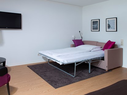 Hotels an der Piste - Suite mit offenem Kamin - Doppelzimmer 35 m2 - Hotel Goldried