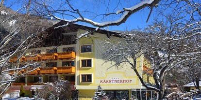 Hotels an der Piste - Kinderbetreuung - Kärntnerhof Winteransicht - Familien- & Sporthotel Kärntnerhof****