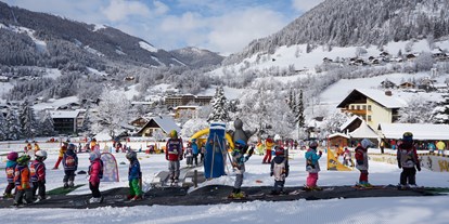 Hotels an der Piste - Hotel-Schwerpunkt: Skifahren & Familie - PLZ 9863 (Österreich) - Spaß in der Kinderschischule - Familien- & Sporthotel Kärntnerhof****