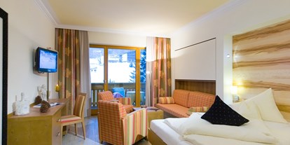 Hotels an der Piste - Sonnenterrasse - PLZ 9565 (Österreich) - Komfortzimmer Nockberge - Familien- & Sporthotel Kärntnerhof****