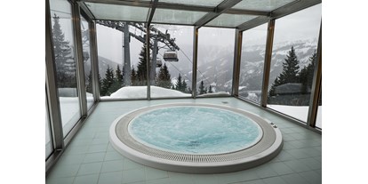 Hotels an der Piste - Parkplatz: gebührenpflichtig in Gehweite - Skigebiet Riesneralm Donnersbachwald - Hotel Berghof Riesneralm