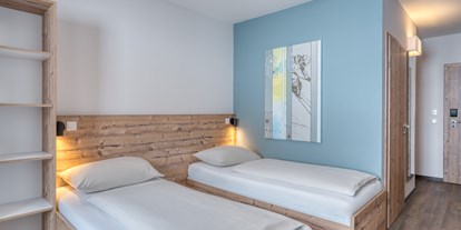 Hotels an der Piste - Preisniveau: moderat - Kaiserburg Zimmer - COOEE alpin Hotel Bad Kleinkirchheim