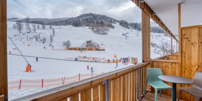 Hotels an der Piste - geführte Skitouren - Nockberge - Kaiserburg Zimmer - COOEE alpin Hotel Bad Kleinkirchheim