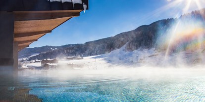 Hotels an der Piste - Skiraum: videoüberwacht - Burk (Mittersill) - Beheizter Infinity Pool - Hotel Bacher Asitzstubn