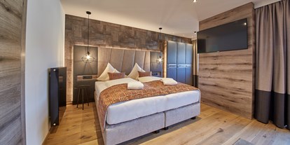 Hotels an der Piste - Hotel-Schwerpunkt: Skifahren & Familie - PLZ 6352 (Österreich) - Zimmer im Neuen Stil - 4****S Hotel Hasenauer