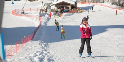 Hotels an der Piste - Ski-In Ski-Out - Unterwössen - Ausgestattet mit neuester Technologie bringt unser Schlepp- und Tellerlift alle Skifahrer - groß und klein - sicher auf den Lärchenhof-Kogel - Der Lärchenhof