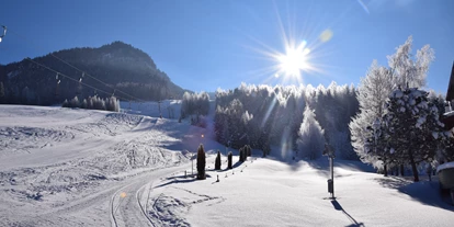 Hotels an der Piste - Ski-In Ski-Out - Unterwössen - Auf die ersten Schwünge in der Morgensonne müssen Sie nicht lange warten! - Der Lärchenhof