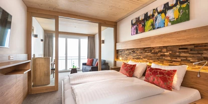 Hotels an der Piste - Preisniveau: gehoben - Urreiting - Doppelzimmer comfort mit Balkon - Berghotel Sonnhof