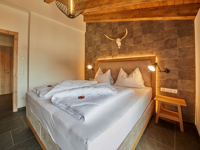 Hotels an der Piste - Pools: Außenpool beheizt - St. Johann in Tirol - AlpenParks Hotel & Apartment Sonnleiten Saalbach