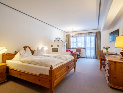 Hotels an der Piste - Verpflegung: Halbpension - Treffling (Seeboden am Millstätter See) - Superior Zimmer - Hotel GUT Trattlerhof & Chalets****