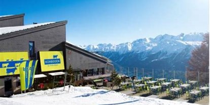Hotels an der Piste - Preisniveau: günstig - Bettmeralp - Ansicht Alpenlodge mit Terrase - Alpenlodge Kühboden Fiescheralp