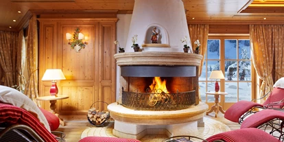 Hotels an der Piste - Hotel-Schwerpunkt: Skifahren & Familie - Lechaschau - Ruheraum mit offenem Kamin - Hotel Singer - Relais & Châteaux