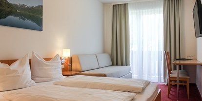 Hotels an der Piste - Obertauern - Doppelzimmer mit einem Doppelbett und zusätzlicher Schlafcouch oder Stockbett  - Familienhotel Botenwirt ***S