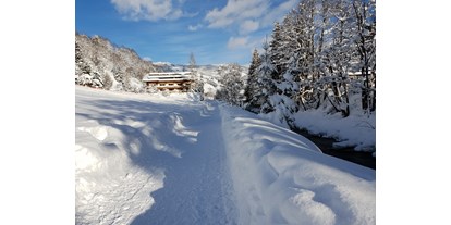 Hotels an der Piste - Ski-In Ski-Out - Ruhige Lage, 800 m am geräumten Wanderweg bis in das Dorfzentrum Hinterglemm. - Erstklassig & down to Earth - das bio-zertifizierte Gartenhotel Theresia****S 