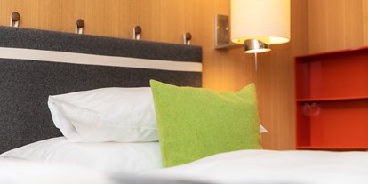 Hotels an der Piste - Salzburg - Zimmer/Suite Typ "Design" - Erstklassig & down to Earth - das bio-zertifizierte Gartenhotel Theresia****S 