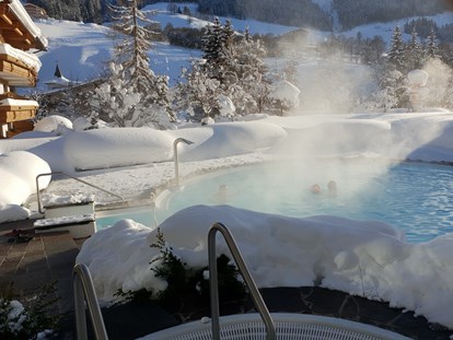 Hotels an der Piste - Wellnessbereich - Outdoor-Schwimmbad (31° C) & Whirlpool (38° C) - Erstklassig & down to Earth - das bio-zertifizierte Gartenhotel Theresia****S 